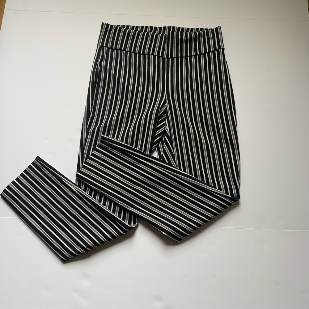 Black striped straight leg pants.